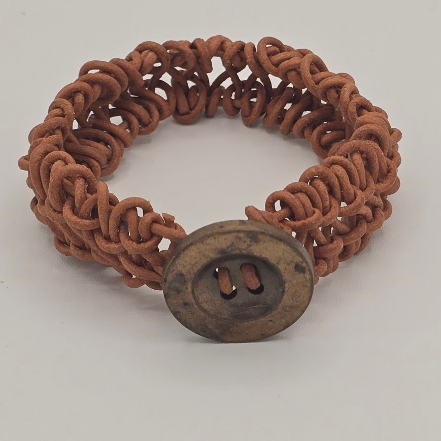 Handmade Jewelry; Woven Natural Tan Leather and Large Decorative Button Tina Lucas; The Cool Collective; Woman-Owned Small Business