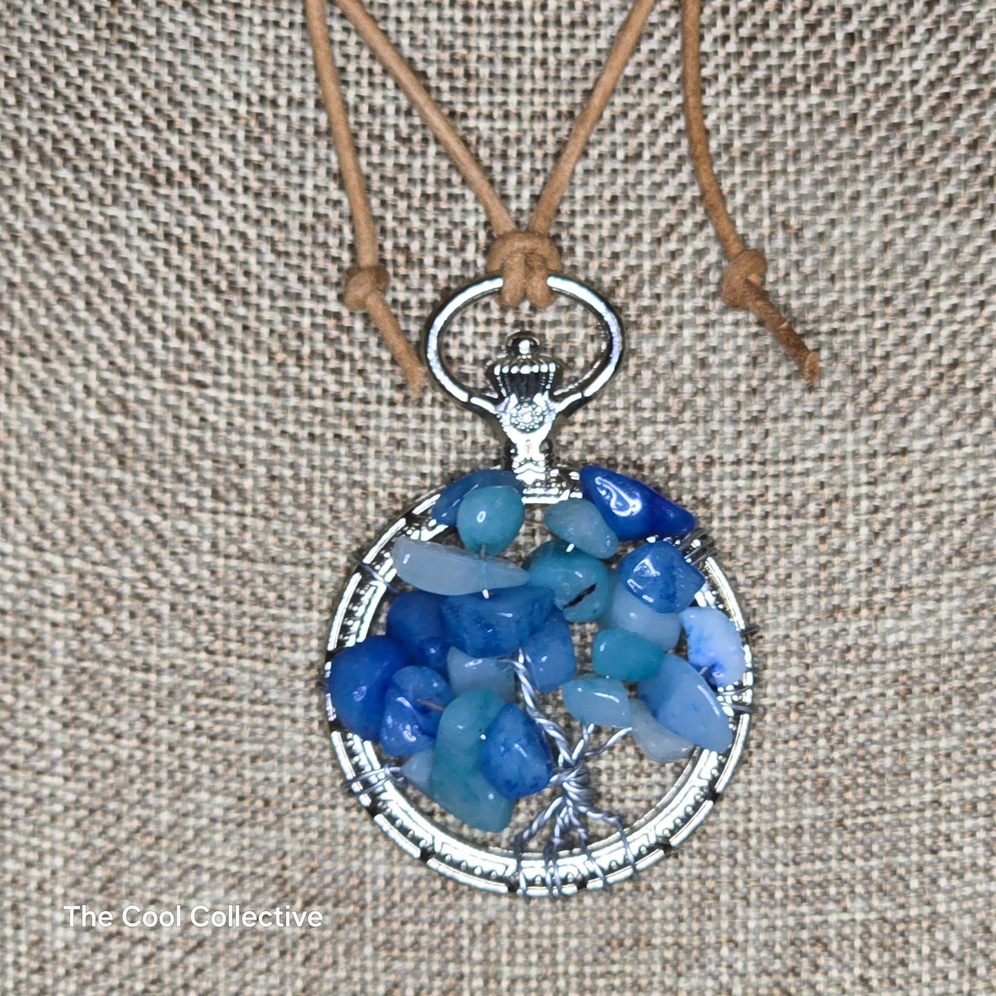 Handmade Jewelry; Tree of Life; Blue Quartz; Silver Frame; Natural Tan Leather; Adjustable Necklace; Tina Lucas; The Cool Collective; Woman-Owned Small Business