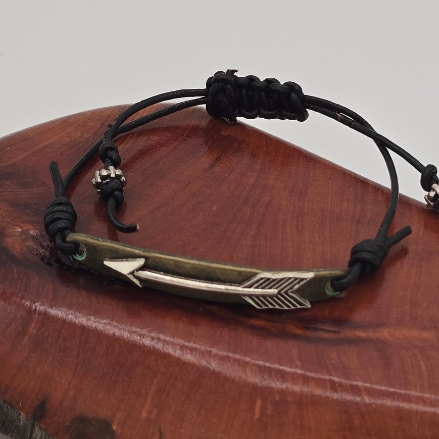 Handmade Jewelry; Layered Metal Arrow Focal Bracelet on Black Leather with Adjustable Closure; Tina Lucas; The Cool Collective; Woman-Owned Small Business
