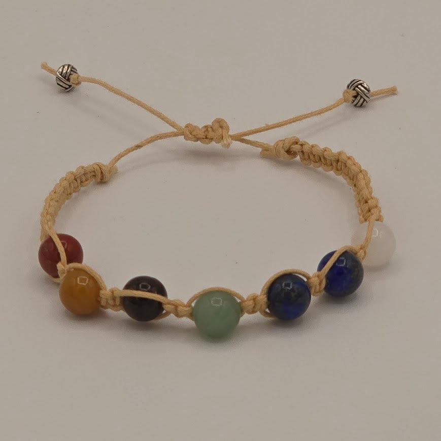Handmade Jewelry; Chakra Bracelets; Cream Cotton Cord; Adjustable Style; Silver Tone Accents; Tina Lucas; The Cool Collective; Woman-Owned Small Business