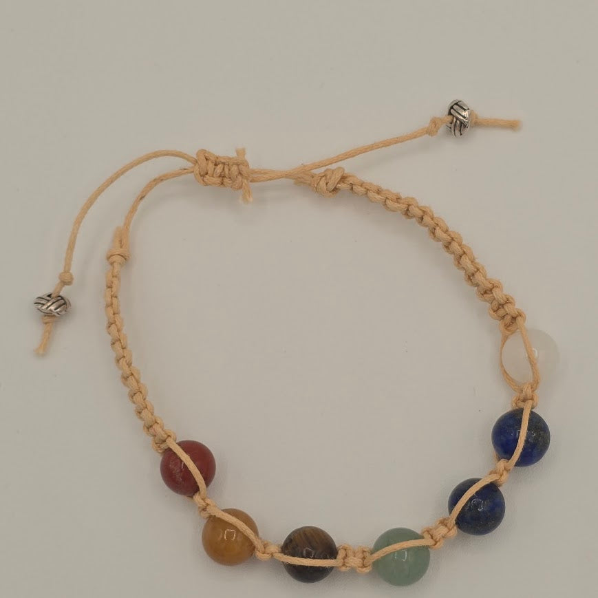 Handmade Jewelry; Chakra Bracelets; Cream Cotton Cord; Adjustable Style; Silver Tone Accents; Tina Lucas; The Cool Collective; Woman-Owned Small Business