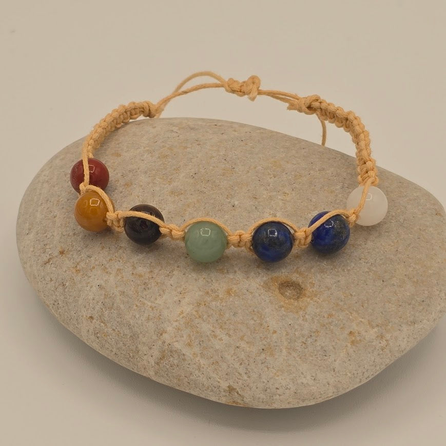 Handmade Jewelry; Chakra Bracelets; Cream Cotton Cord; Adjustable Style; Silver Tone Accents; Tina Lucas; The Cool Collective; Woman-Owned Small Business