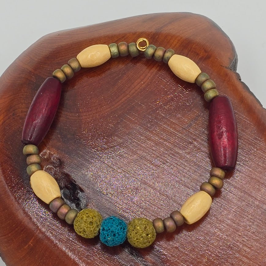 Handmade Jewelry; Memory Wire Bracelet with Glass, Wood, and Lava Beads; Tina Lucas; The Cool Collective; Woman-Owned Small Business