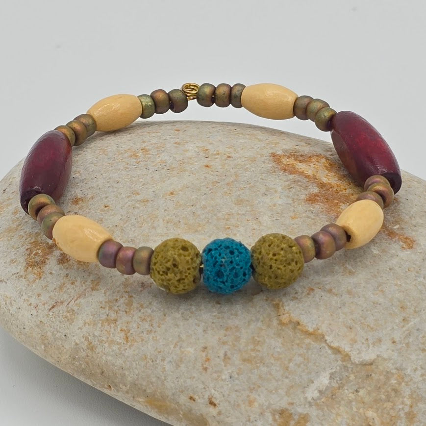 Handmade Jewelry; Memory Wire Bracelet with Glass, Wood, and Lava Beads; Tina Lucas; The Cool Collective; Woman-Owned Small Business