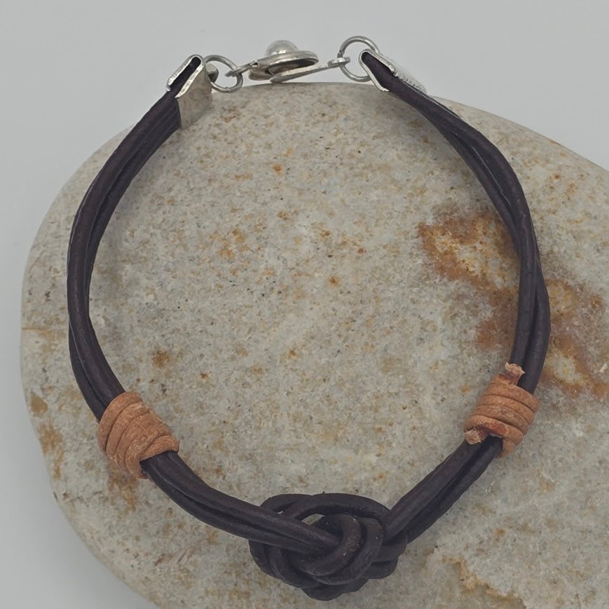 Handmade Jewelry; Dark Brown Leather LOVE Knot; Natural Tan Leather Accents; Tina Lucas; The Cool Collective; Woman-Owned Small Business