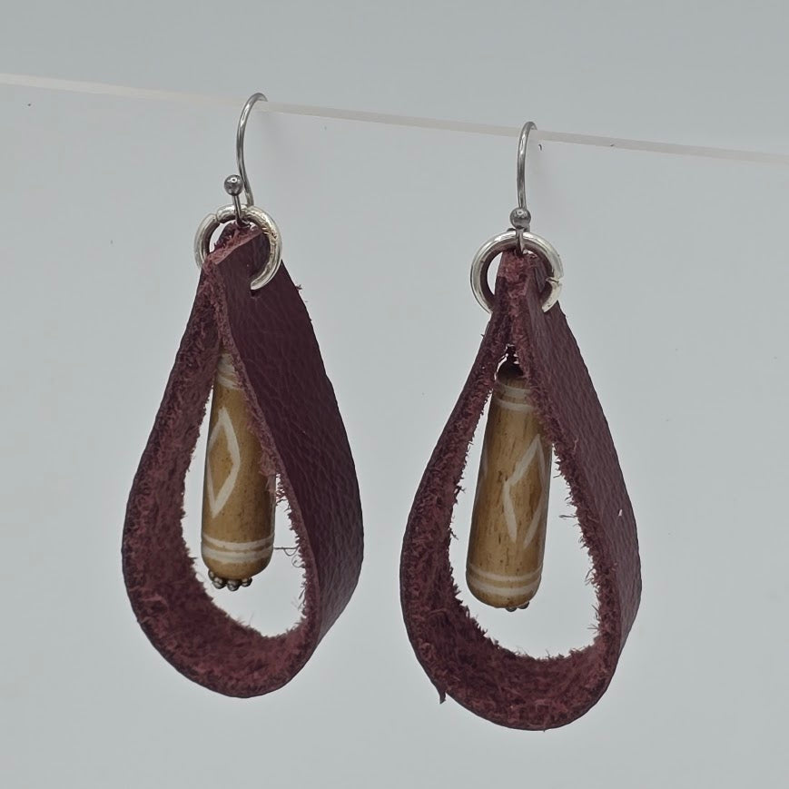 Maroon Leather Loops With Carved Bone Dangle on Stainless Steel Ear Wires