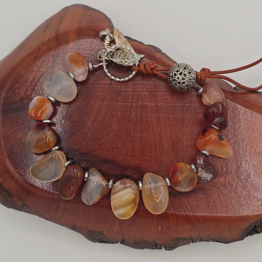 Handmade Jewelry;  Carnelian and Hematite with Medium Brown Leather and Charms; Tina Lucas; The Cool Collective; Woman-Owned Small Business