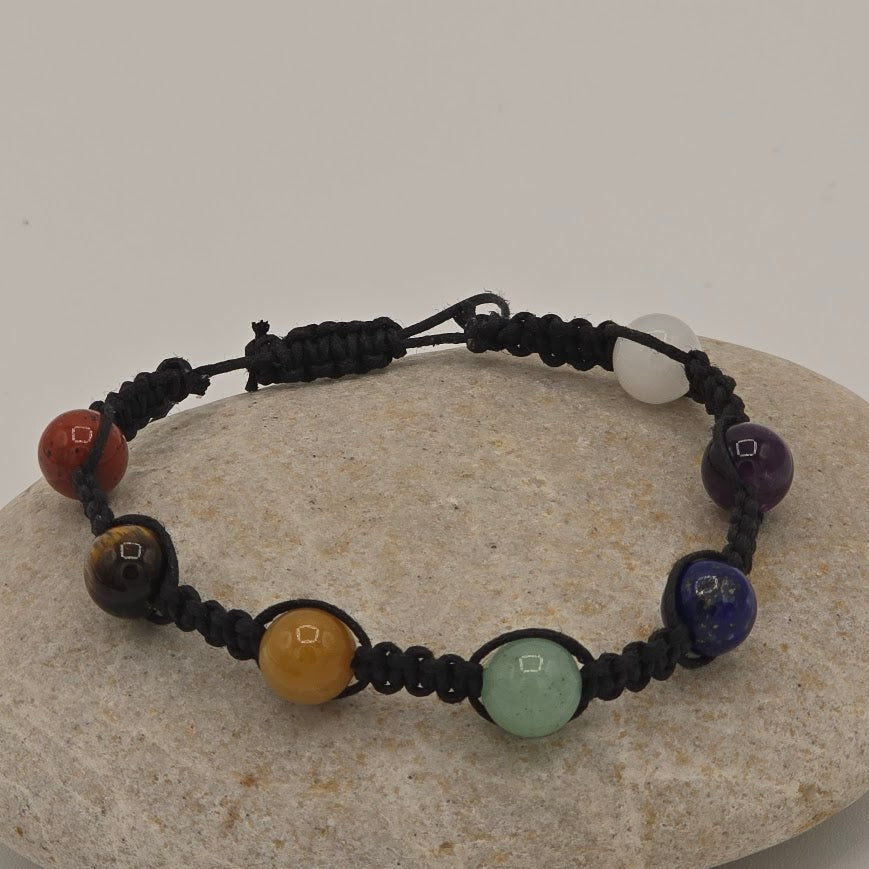 Handmade Jewelry; Chakra Bracelets; Black Cotton Cord; Adjustable Style; Silver Tone Accents; Tina Lucas; The Cool Collective; Woman-Owned Small Business