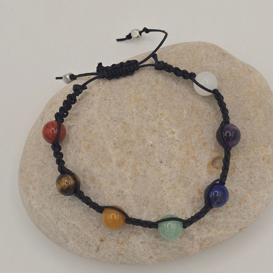 Handmade Jewelry; Chakra Bracelets; Black Cotton Cord; Adjustable Style; Silver Tone Accents; Tina Lucas; The Cool Collective; Woman-Owned Small Business
