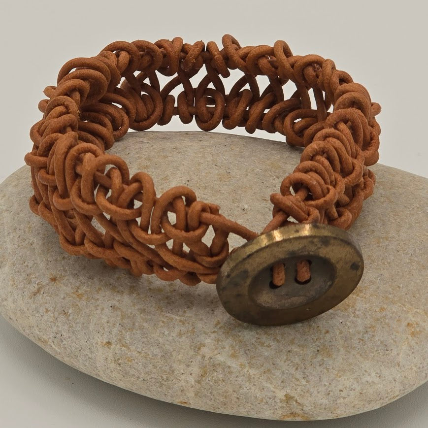Handmade Jewelry;  Woven Natural Tan Leather and Large Decorative Button Tina Lucas; The Cool Collective; Woman-Owned Small Business