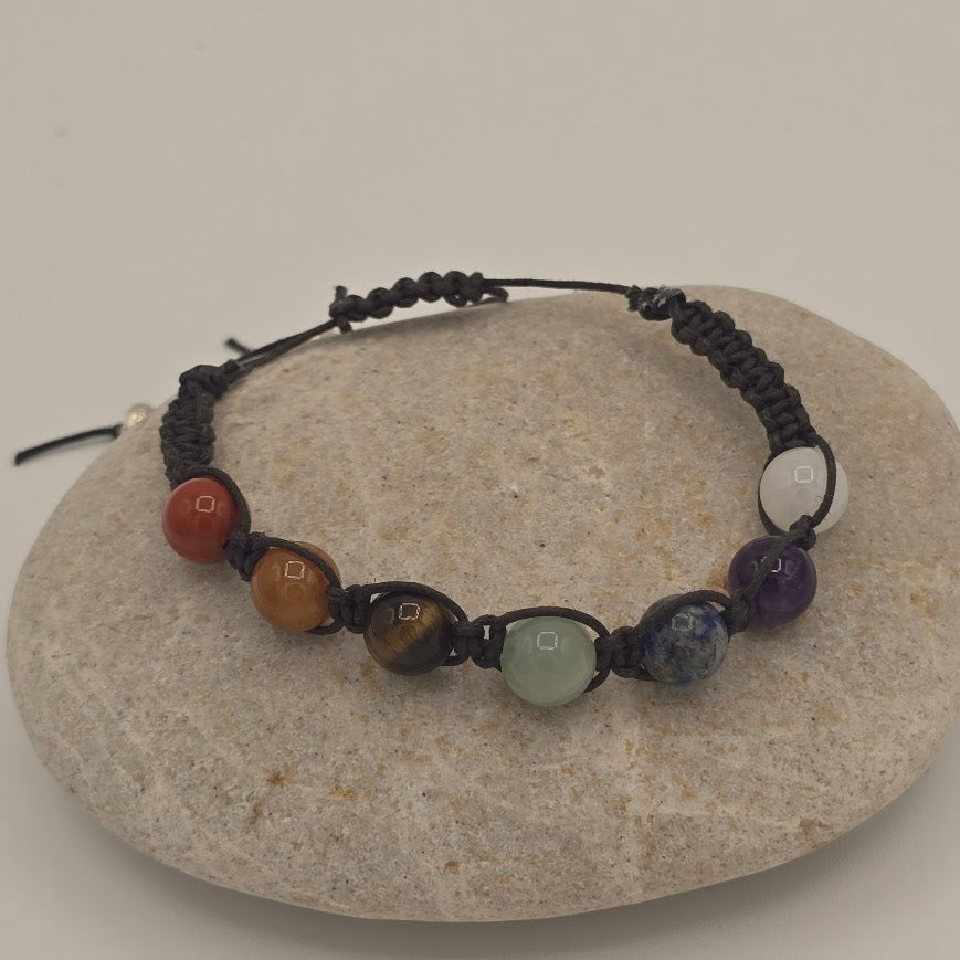 Handmade Jewelry; Chakra Bracelets; Black Cotton Cord; Adjustable Style; Silver Tone Accents; Tina Lucas; The Cool Collective; Woman-Owned Small Business