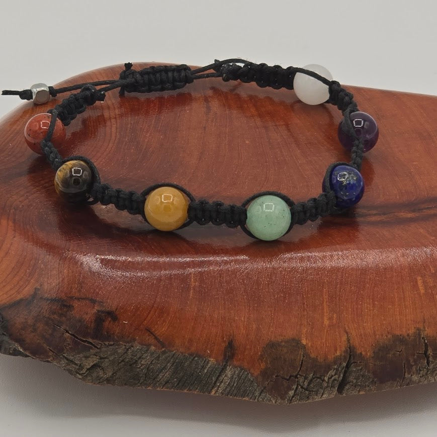 Handmade Jewelry; Chakra Bracelets; Black Cotton Cord; Adjustable Style; Silver Tone Accents; Tina Lucas; The Cool Collective; Woman-Owned Small Business