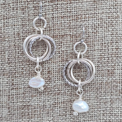 White Pearls and Mobius Earrings on Stainless Steel Wires
