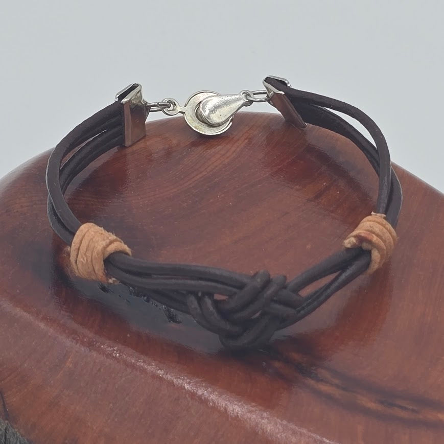 Handmade Jewelry; Dark Brown Leather LOVE Knot; Natural Tan Leather Accents; Tina Lucas; The Cool Collective; Woman-Owned Small Business