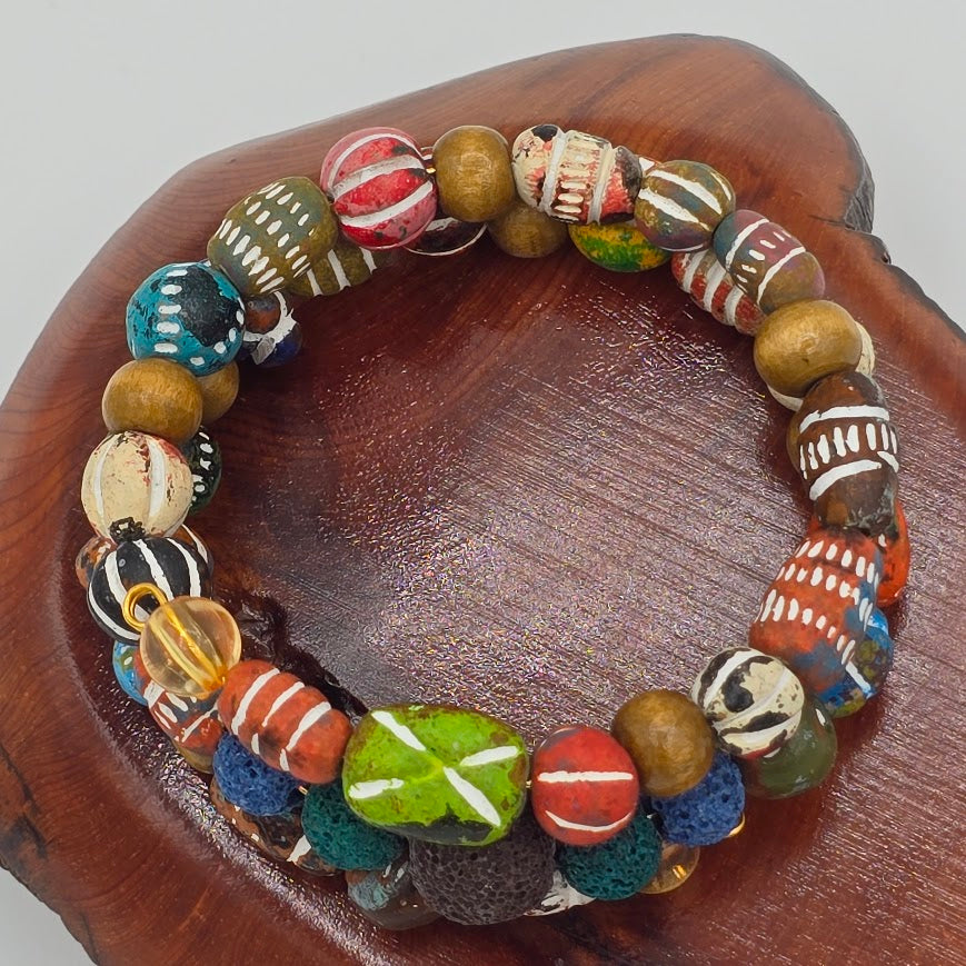 Handmade Jewelry; Memory Wire Bracelet with Vibrant Clay Beads and Lava Beads; Tina Lucas; The Cool Collective; Woman-Owned Small Business