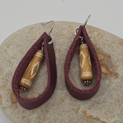Maroon Leather Loops With Carved Bone Dangle on Stainless Steel Ear Wires