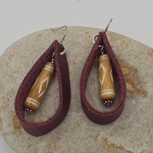 Maroon Leather Loops With Carved Bone Dangle on Stainless Steel Ear Wires