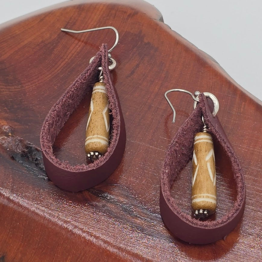 Maroon Leather Loops With Carved Bone Dangle on Stainless Steel Ear Wires