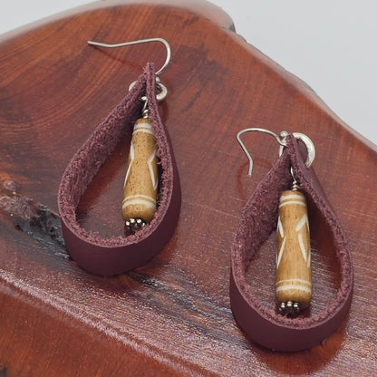 Maroon Leather Loops With Carved Bone Dangle on Stainless Steel Ear Wires