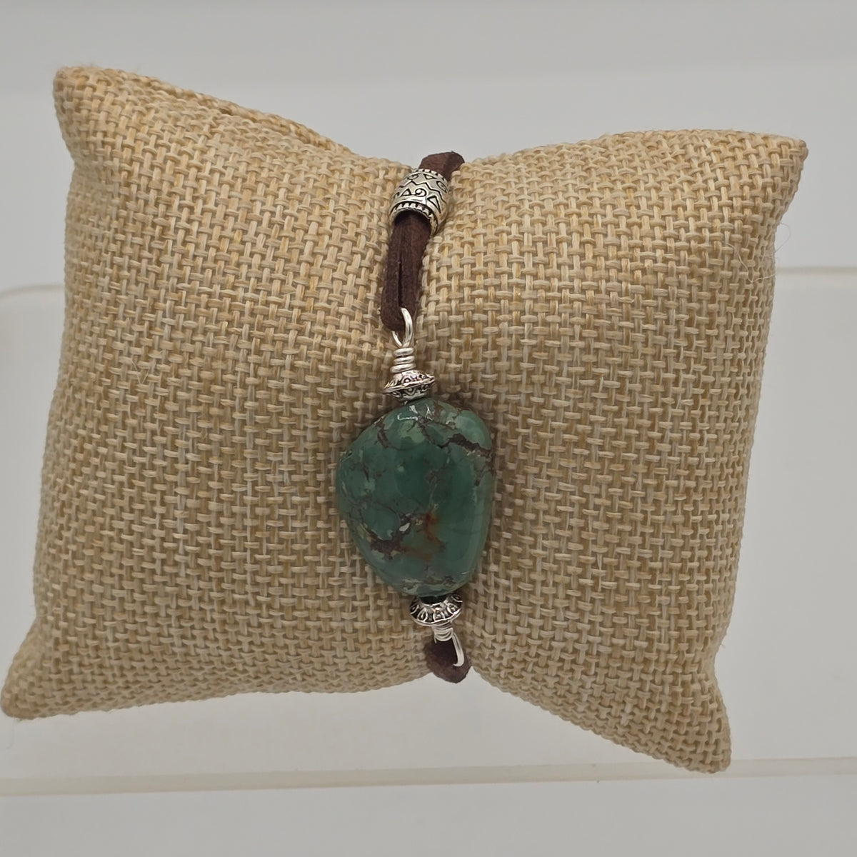 Turquoise Nugget on Brown Suede With Silver Tone Accents