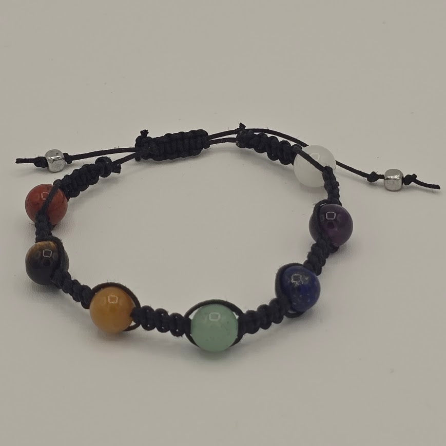 Handmade Jewelry; Chakra Bracelets; Black Cotton Cord; Adjustable Style; Silver Tone Accents; Tina Lucas; The Cool Collective; Woman-Owned Small Business