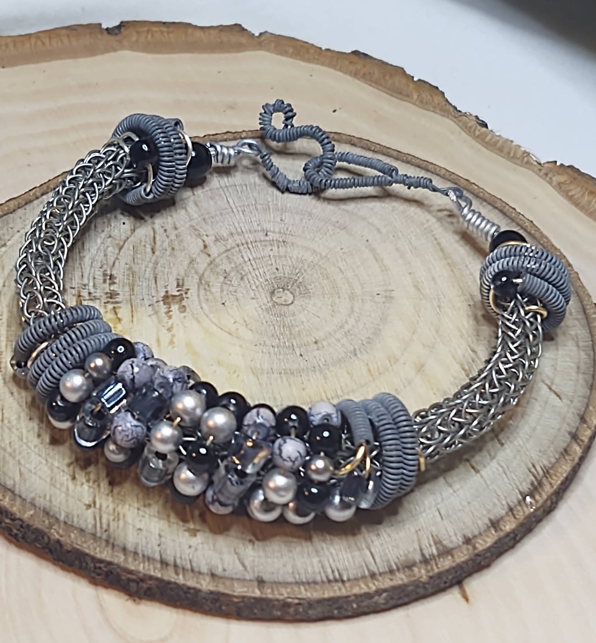 Handmade Jewelry; Viking Knit;  Silver, Gray, and Black Wire and Beads; Bangle Bracelet;  Tina Lucas; The Cool Collective; Woman-Owned Small Business
