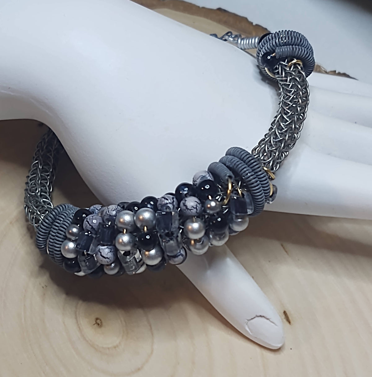 Handmade Jewelry; Viking Knit;  Silver, Gray, and Black Wire and Beads; Bangle Bracelet;  Tina Lucas; The Cool Collective; Woman-Owned Small Business