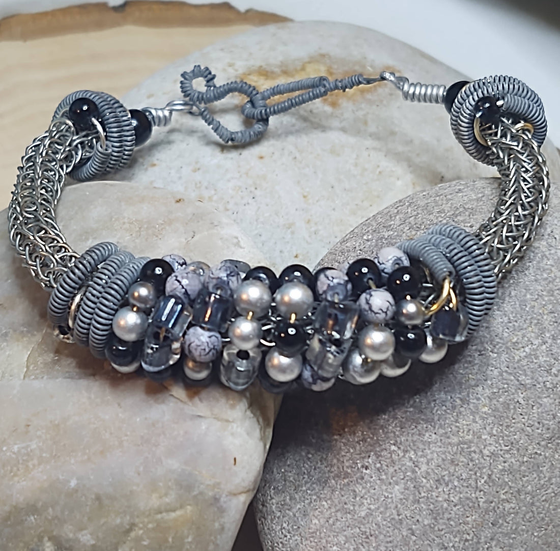 Handmade Jewelry; Viking Knit;  Silver, Gray, and Black Wire and Beads; Bangle Bracelet;  Tina Lucas; The Cool Collective; Woman-Owned Small Business